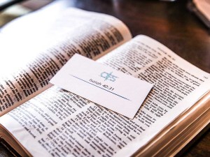 open book with business card 